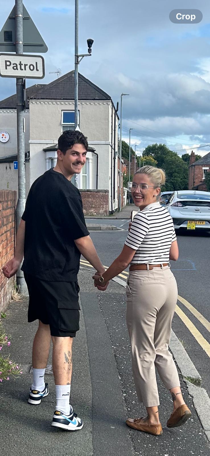 Chris and Jess Holding Hands